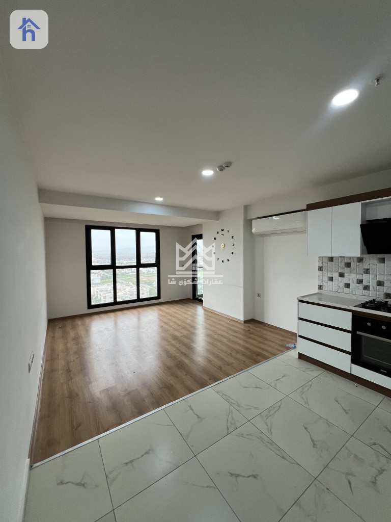 شوقەیەکی دوو ژووری نوستن و ئارام وێنە 2