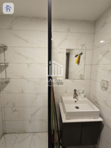 شقة في الطابق العالي بتصميم عصري صورة 13