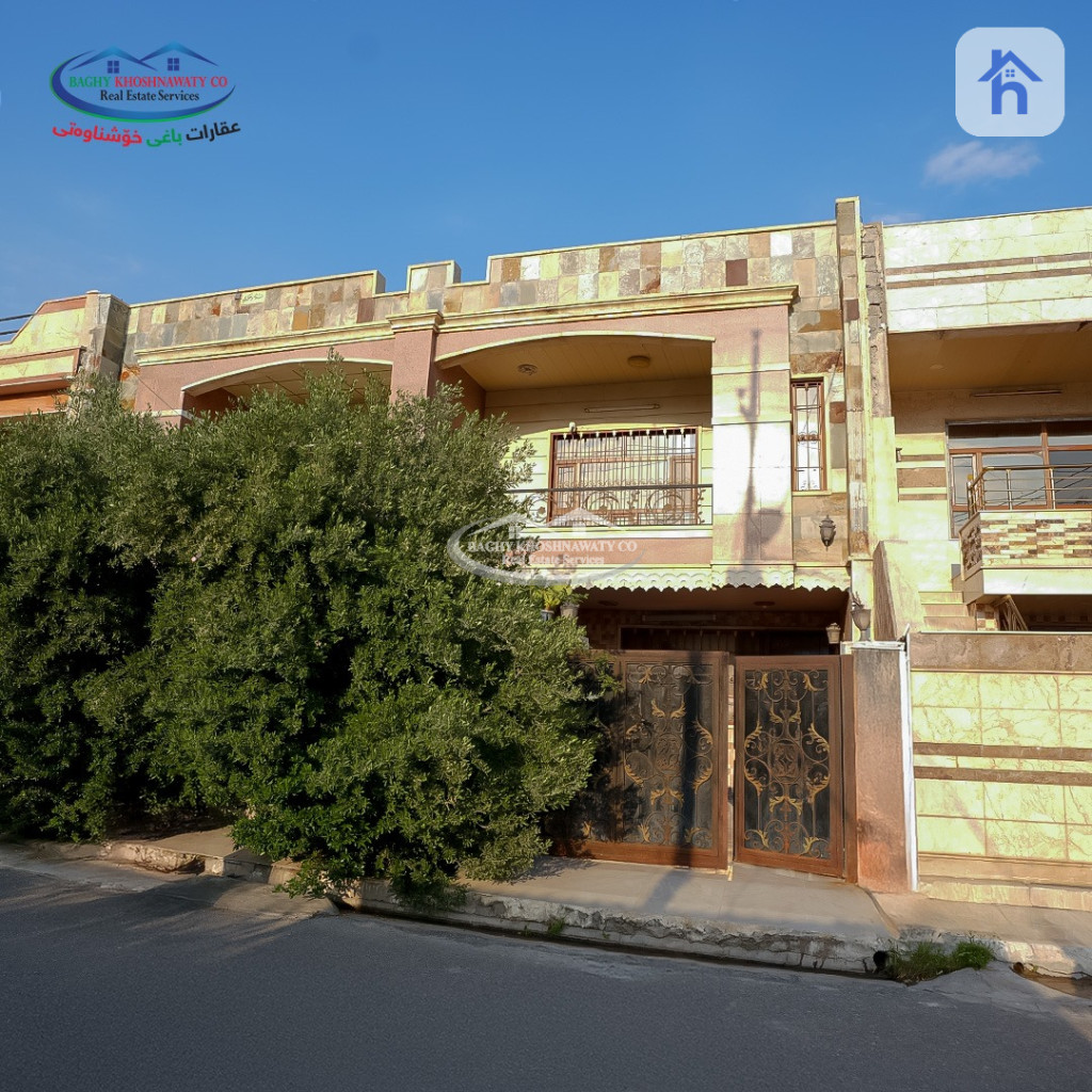 خانوو بەرامبەر باخچە