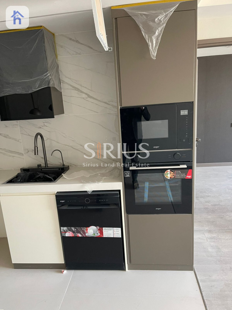 Elegant 1BR Apartment in Cavalli Tower Image 2