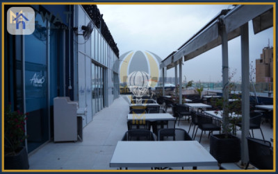 بینای بازرگانی لە جادریە image 1