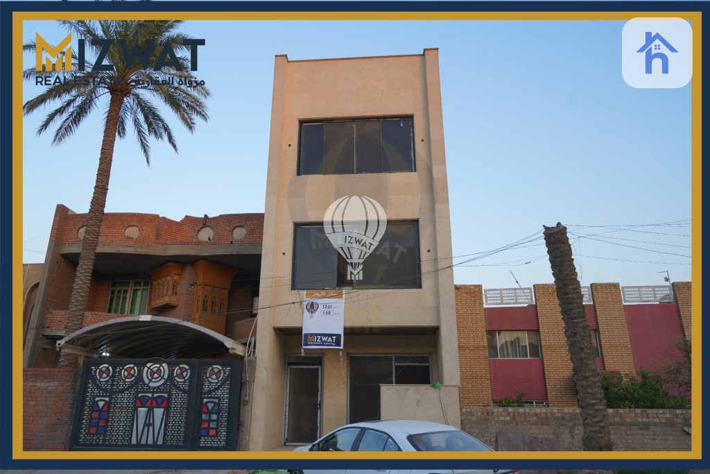 بینای نیشتەجێبوونی سێ نهۆمی لە ئەلمەنسور