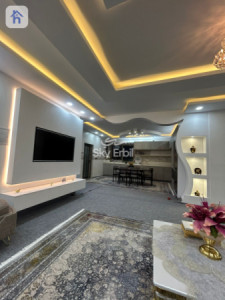 خانوویەکی فراوان و دیمەنی شاخ image 2