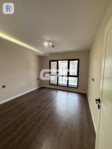 Modern one-bedroom apartment image 2