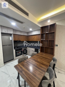 شقة مفروشة حديثة مع إطلالة رائعة image 2