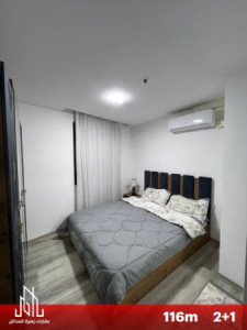 شوقەیەکی مۆدێرن و ڕاخراو لەگەڵ دیمەنی شار image 10