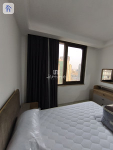 Cozy 2-Bedroom Apartment in Empire Pearl Towers Image 4