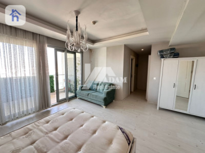 شوقەیەکی یەک ژووری نوستن بە دیمەنە سەرسوڕهێنەرەکانەوە وێنە 5