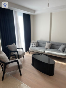 Cozy Furnished Apartment in Empire Wings image 1