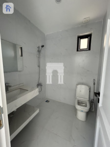 خانوویەکی فراوان بە ڕووبەری ٢٠٠ مەتر چوارگۆشە لە دیاری وێنە 9