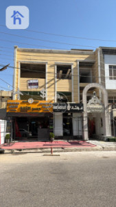 بناية تجارية مع مصادر دخل متنوعة image 1