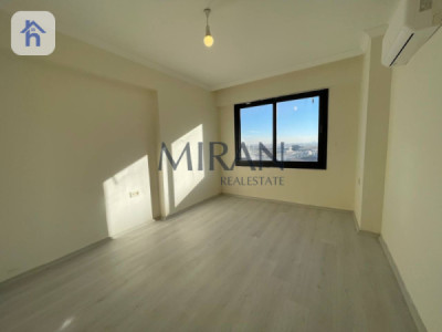 شوقەیەکی ئارام لەگەڵ ژووری میوانێکی فراوان وێنە 3