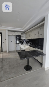 شوقەیەکی مۆدێرن یەک ژووری نوستن لە ڕامی تاوەر وێنە 3