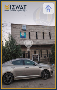 بینای بازرگانی لە بەغدا، بەیاع image 2