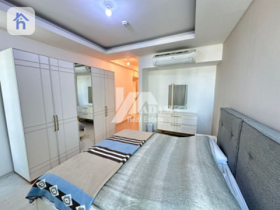 Cozy 1-Bedroom Apartment in Empire Wings Image 6