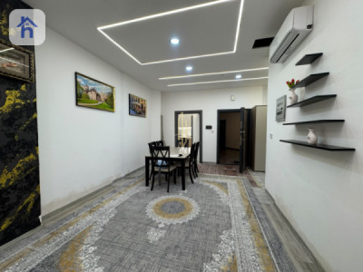 شوقە بە دوو ژووری نووستن ڕاخراو image 4