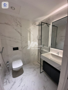 Elegant 4-Bedroom Apartment with Balcony Image 24