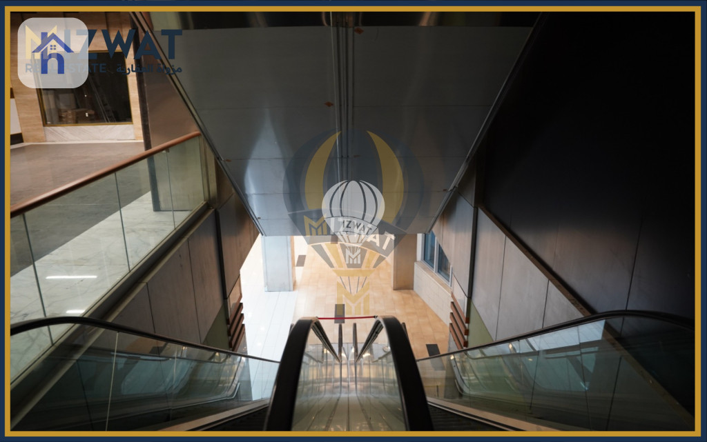 بینای بازرگانی لە جادریە وێنە 10