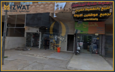 مبنى تجاري واسع مع 5 محلات image 2