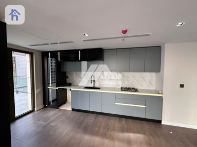 Elegant 2-BR Apartment with Terrace Image 3