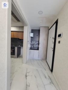 شوقەیەکی دوو ژووری نوستن لەگەڵ دیمەنی شار وێنە 4