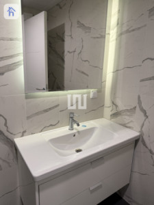 Cozy 1-Bedroom Apartment in Empire Wings Image 6