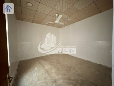 خانوویەکی فراوان بە دوو ژووری نوستن وێنە 7