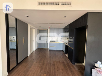 شوقەیەکی مۆدێرن بە یەک ژووری نوستن image 2