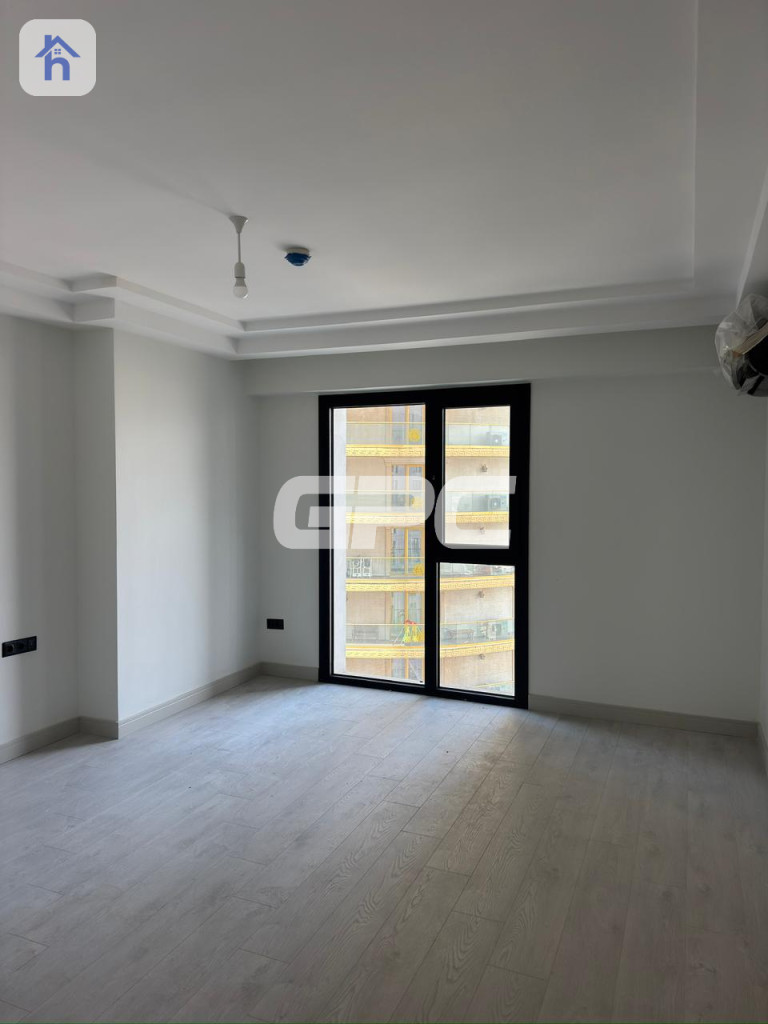 Modern 1-Bedroom Apartment in Rami Towers Image 2