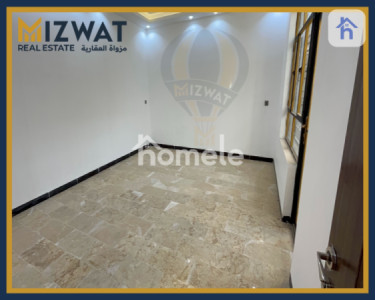 Cozy 3-bedroom House in Al Jihad image 2