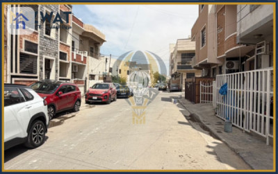 خانوویەکی خێزانی ئارام لە بەغداد وێنە 3