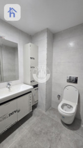 شوقەیەکی مۆدێرن یەک ژووری نوستن لە ڕامی تاوەر وێنە 11