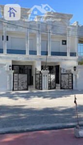 دوو خانوو بەرامبەر باخچە image 1