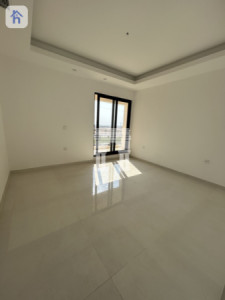 خانوویەکی فراوان بە ڕووبەری ٢٠٠ مەتر چوارگۆشە لە دیاری وێنە 10