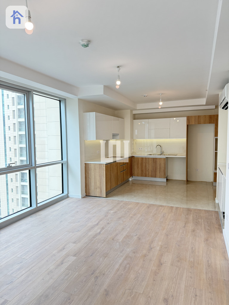 Cozy 1-Bedroom Apartment in Empire Wings Image 2