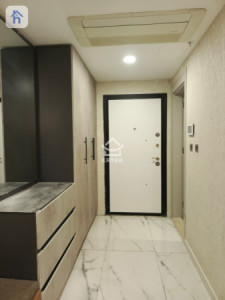 شوقەیەکی ئارام و یەک ژووری نوستن لە سکای تاوەرز وێنە 9