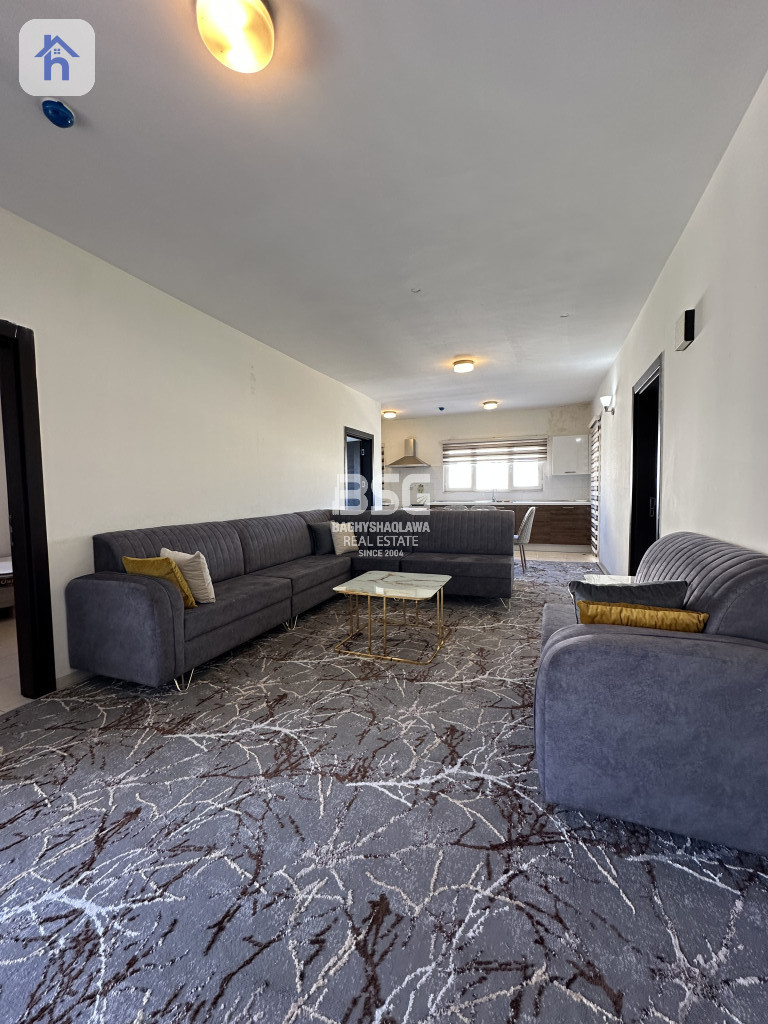 شوقەیەکی ئارام بە دیمەنێکی جوانەوە