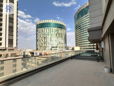 شوقەیەکی مۆدێرن لەگەڵ تەراسێکی فراوان وێنە 5
