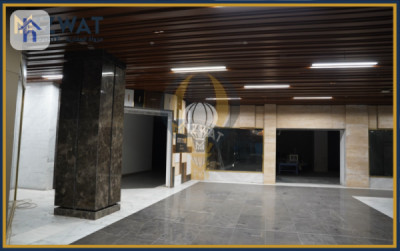 بینای بازرگانی لە جادریە وێنە 9