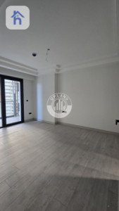 شوقەیەکی مۆدێرن یەک ژووری نوستن لە ڕامی تاوەر وێنە 5