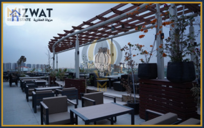 بینای بازرگانی لە جادریە وێنە 3