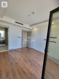 شوقەیەکی دوو ژووری نوستن لەگەڵ دیمەنی شار وێنە 11