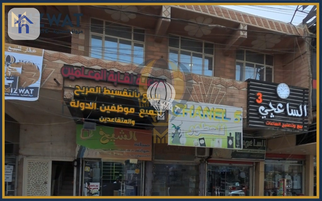 مبنى تجاري واسع مع 5 محلات صورة 5