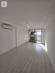 Cozy Apartment in Empire Pearl Towers image 1
