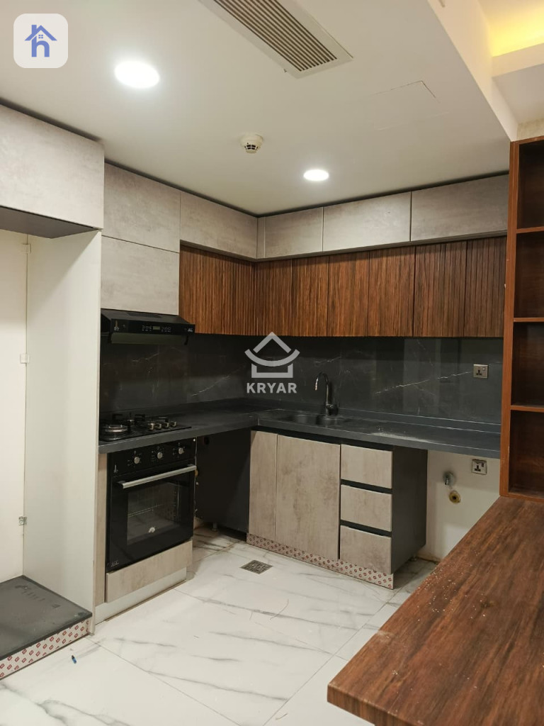 شوقەیەکی ئارام و یەک ژووری نوستن لە سکای تاوەرز وێنە 2