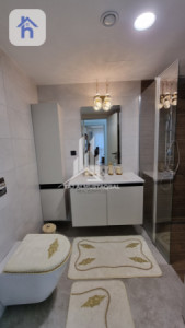 شقة عصرية بثلاث غرف نوم صورة 11