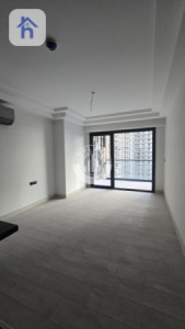 شوقەیەکی مۆدێرن یەک ژووری نوستن لە ڕامی تاوەر وێنە 4