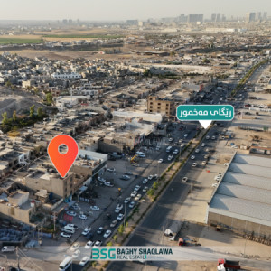 ملک تجاریة بدخل شهري جيد للبيع علی طریق مخمور image 2