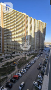 شوقەیەکی مۆدێرن یەک ژووری نوستن لە ڕامی تاوەر وێنە 15