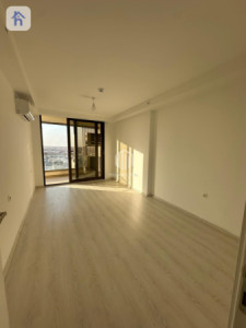 شوقەیەکی مۆدێرن بۆ یەک ژووری نوستن لە تاوەرەکانی ئیمپایەر پیرڵ وێنە 3